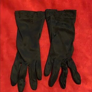 Black fabric gloves.